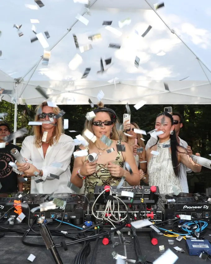 Confetti over the DJ booth at a Dion summer event